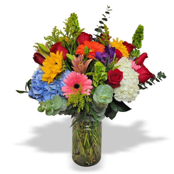 Spring's blooming colors are spectacular; our arrangement, 'Welcome Spring,' showcases a range of vibrant blends