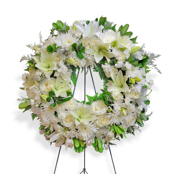 A classic white wreath that conveys peace and rest