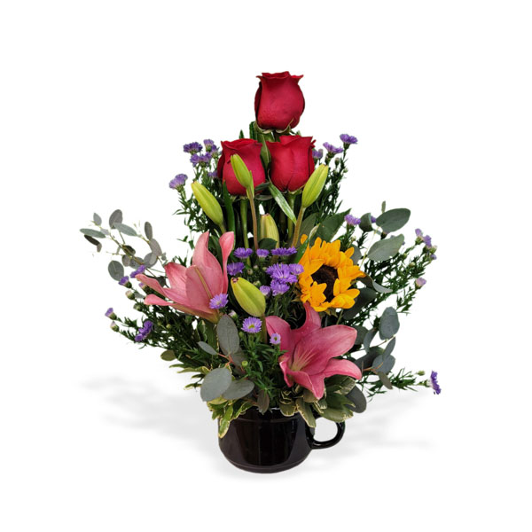 A bouquet of vibrant blooms in a charming mug, perfect for expressing feelings and brightening someone's day